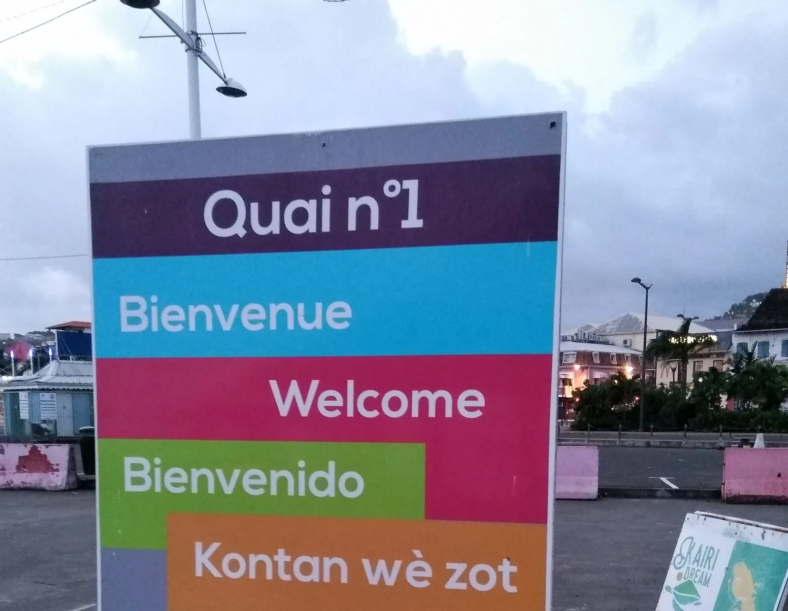 A dockside sign in Fort-de-France greeting arrivals in French, English, Spanish and Creole